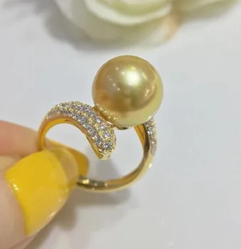 Большое количество красивых круглых колец с натуральным наньхайским золотым жемчугом диаметром 11-10 мм, 925 пробы.